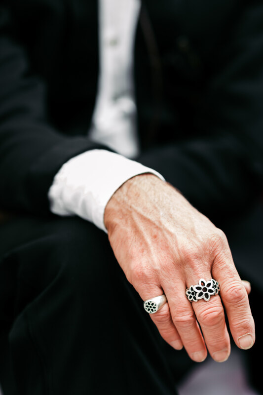 Wedding photography portfolio in Italy: Hand of a man on whose fingers two rings
