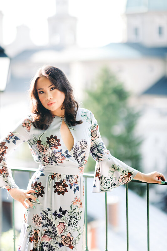 Wedding photography portfolio in Italy: Girl in floral print dress posing on camera