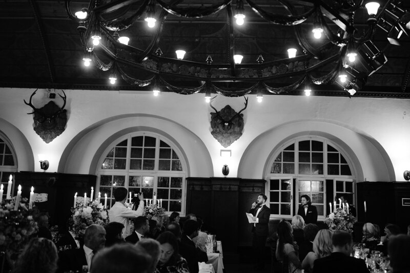Wedding photography portfolio in Italy: One of the guests says a toast, congratulations to the newlyweds