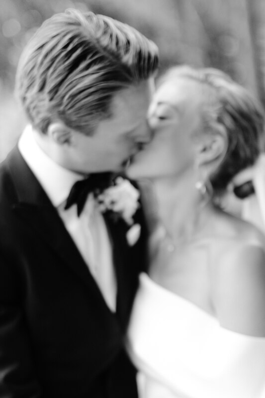 Wedding photography portfolio in Italy: The bride and groom kiss tenderly