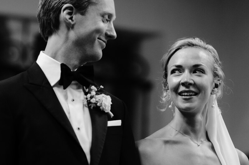 Wedding photography portfolio in Italy: Newlyweds look at each other in church