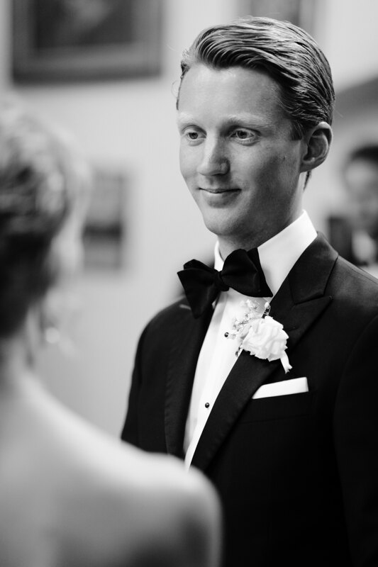 Wedding photography portfolio in Italy: Portrait of a groom who looks at his beloved
