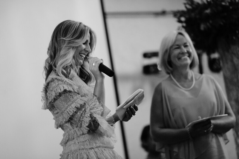 Wedding photography portfolio in Italy: Bridesmaid says toast at the wedding
