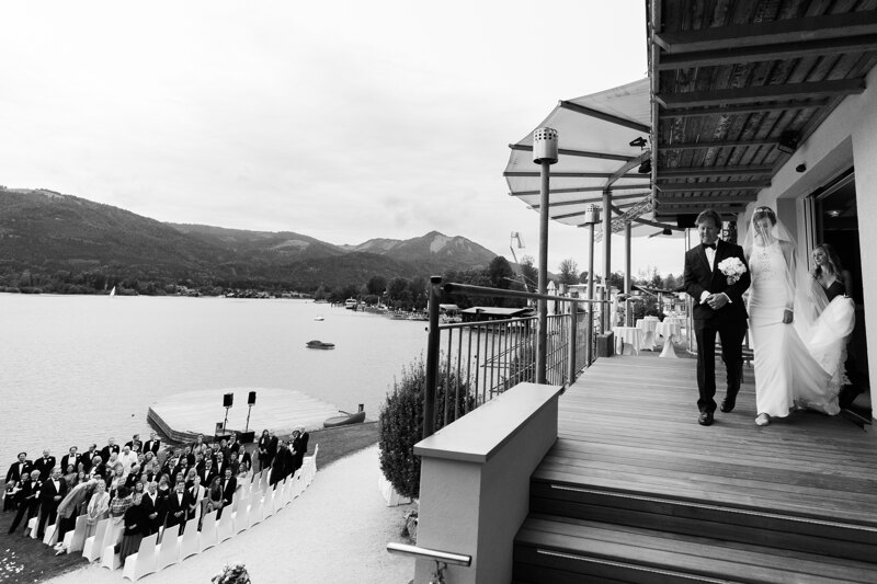 Wedding Photographer in Milan: The moment when the father leads his daughter, already the bride to the altar