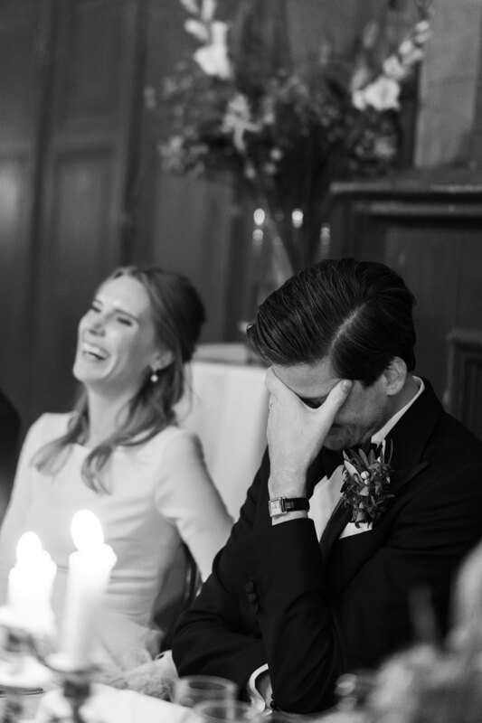 Wedding photography portfolio in Italy: The groom was ashamed and covered his face with his hand, the bride sincerely smiles next