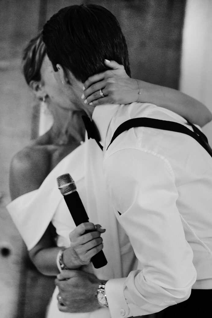 Wedding photoshoot in Italy: Passionate kiss of a couple, after touching words of the bride