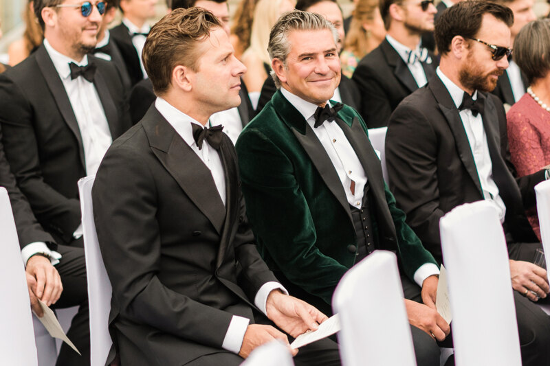 Wedding photography portfolio in Italy: Guests have taken their seats at the wedding ceremony and are awaiting the bride and groom