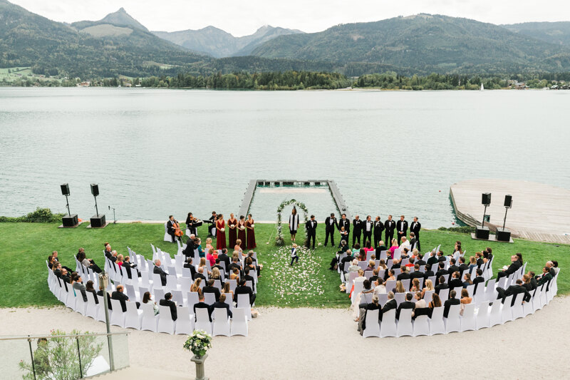 Wedding photography portfolio in Italy: Beautiful wedding ceremony on the shore of a mountain lake