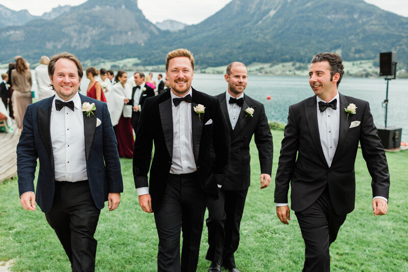Wedding photography portfolio in Italy: Joyful friends of the groom boldly step forward
