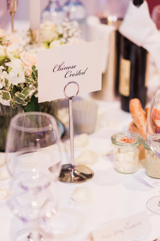 Wedding photography portfolio in Italy: Card with the name of the guest on the guest table in the festive hall