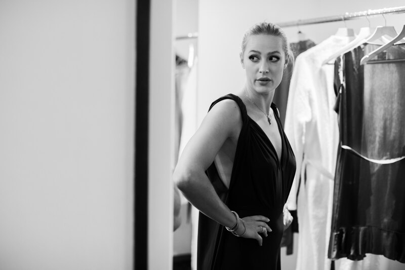 Wedding photography portfolio in Italy: Bridesmaid tries on a dress for bridesmaids